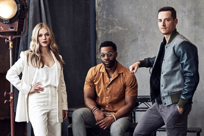 Tracy Spiridakos, LaRoyce Hawkins, and Jesse Lee Soffer posing together