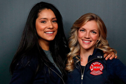 Miranda Rae Mayo (L) and Kara Kilmer arrive on the red carpet at the 3rd Annual Chicago Press Day in Chicago.