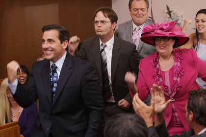 Steve Carell as Michael Scott, Rainn Wilson as Dwight Schrute, Phyllis Smith as Phyllis Lapin dancing during a scene in "The Office"