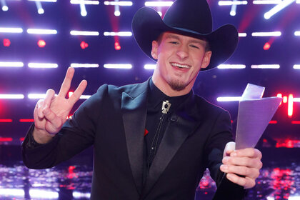 Bryce Leatherwood holding up his Voice trophy on Season 22 of The Voice