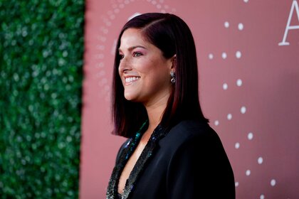 Cassadee Pope posing at the 2021 CMT Artist of the Year red carpet.