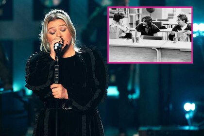 Kelly Clarkson singing on The Kelly Clarkson Show with a movie still of The Breakfast Club.