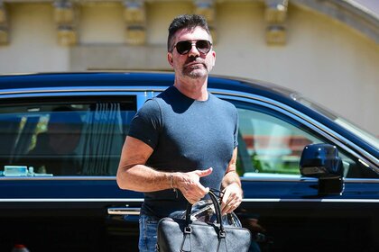 Simon Cowell seen outside next to a car in Pasadena, California.