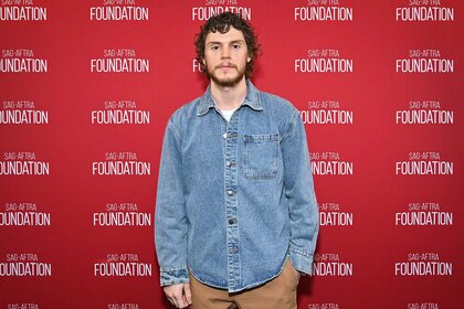 Evan Peters appears at an event.