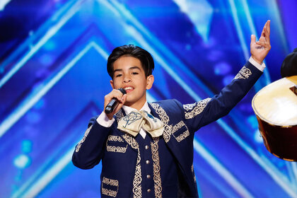 Eduardo Antonio Trevino performs on the AGT stage