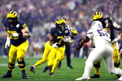 Michigan Wolverines football team during a game.