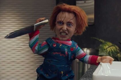 Sarah Sherman digitally altered as the character Chucky, holding a knife during the Chucky sketch on Saturday Night Live.