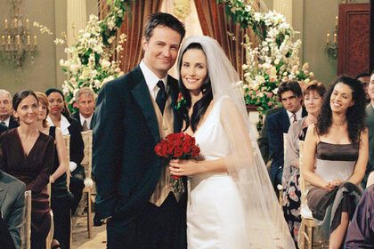 Monica and Chandler on the aisle at their wedding on friends