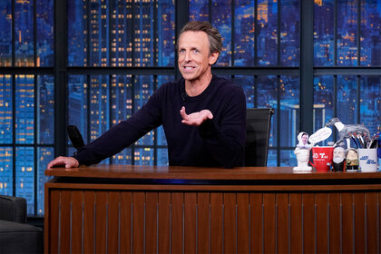 Seth Meyers sits at his desk during Late Night With Seth Meyers episode 1422