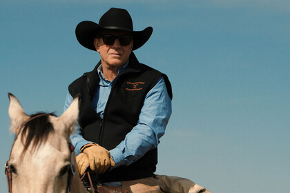 Kevin Costner as John Dutton rides a horse on the show Yellowstone