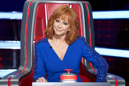 Reba McEntire in her coaches chair on the voice episode 2508