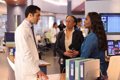 Dr. Crockett Marcel (Dominic Rains), Sharon Goodwin, and Maggie Lockwood appear in Chicago Med Season 9 Episode 12.