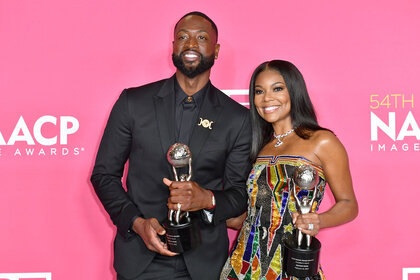 Dwyane Wade and Gabrielle Union, recipients of the President's Award, pose in the press room during the 54th NAACP Image Awards