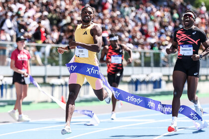 Noah Lyles of the United States crosses the finish line winning a men's 200m