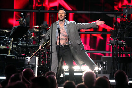 Adam Levine on stage performing during the 38th Annual Rock & Roll Hall Of Fame Induction Ceremony