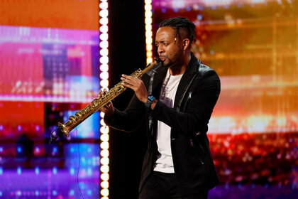 B. Thompson performs on stage on America's Got Talent Episode 1906