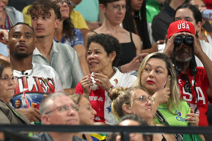 Johnathan Owens watches Simone Biles compete at the 2024 Olympics