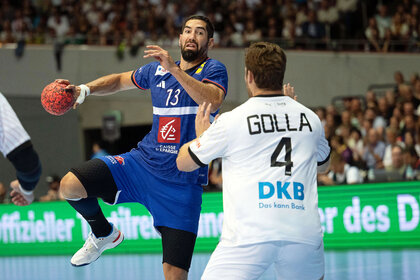 Two Olympic handball players compete