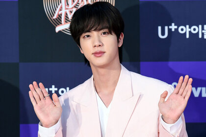 Jin of BTS arrives at the photo call for the 34th Golden Disc Awards