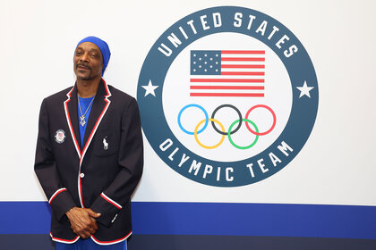 Snoop Dogg tries on clothes during Team USA Welcome Experience ahead of Paris 2024 Summer Olympics