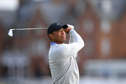 Tiger Woods swings a club at the 152nd Open Championship