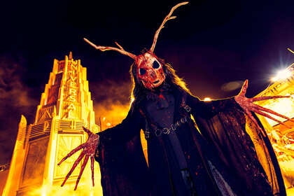 A person dressed in a costume at Halloween Horror Nights.