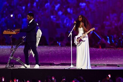 H.E.R. performs the U.S. national anthem at the Olympic Closing Ceremony