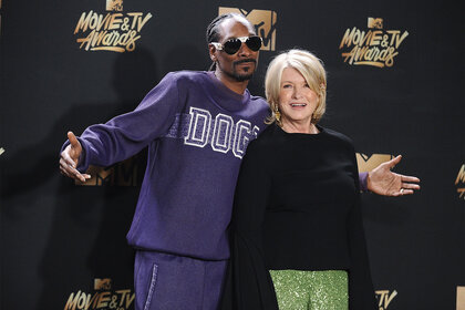 Snoop Dogg and Martha Stewart pose in the press room at the 2017 MTV Movie and TV Awards