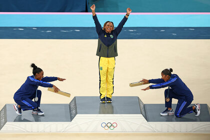 Simone Biles and Jordan Chiles bow down to Rebeca Andrade at the 2024 Olympics