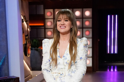 Kelly Clarkson smiles at her audience