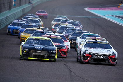 Nascar drivers on the track during a race during the NASCAR Cup Series 4EVER 400