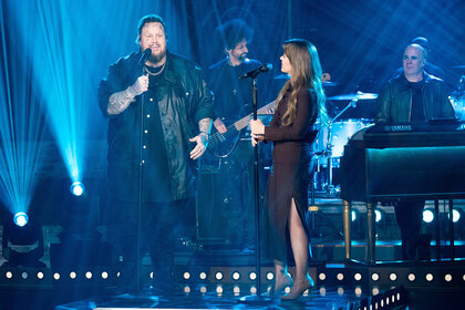 Jelly Roll sits and Kelly sing together on stage on The Kelly Clarkson Show Season 6 Episode 18