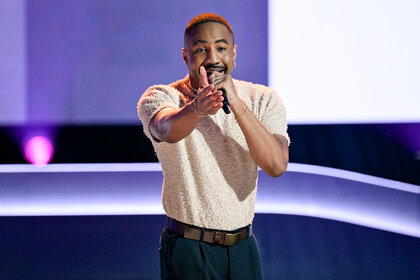 Deon Jones performs on stage on The Voice Season 26 Episode 5