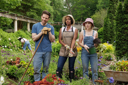 Brett, Catherine and Alice stand in a large garden on Grosse Pointe Garden Society Season 1 Episode 1