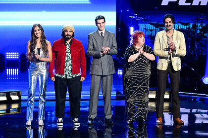 Team Reba stands together on stage on The Voice Season 26 Episode 16.