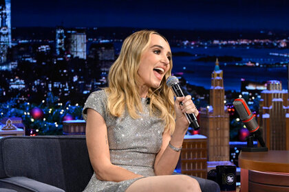 Chloe Fineman sings into a mic on The Tonight Show Starring Jimmy Fallon Episode 2072.