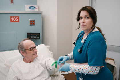 Alex treats a patient on St. Denis Medical Season 1 Episode 6.