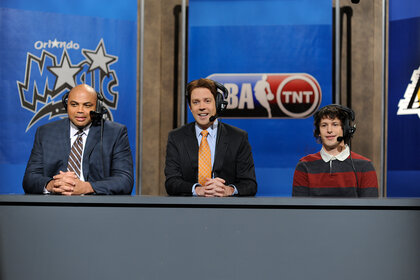 Charles Barkley, Jason Sudiekis and Andy Samberg sit at a desk on Saturday Night Live Season 35, Episode 11