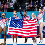 Jade Carey, Sunisa Lee, Simone Biles, Jordan Chiles and Hezly Rivera of Team United States celebrate winning the gold medal