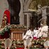 Pope Francis sits at the head of St. Peter's Basilica.