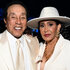 Smokey Robinson and Frances Gladney both wear white to an Academy Awards Viewing Party