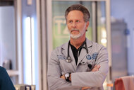 Dr. Archer (Steven Weber) folds his arms on Chicago Med episode 901.