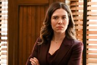 Asa Chapman crosses her arms in a burgundy suit on Chicago P.D. Season 11 Episode 1.