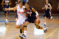 Cierra Burdick during a play during a basketball game