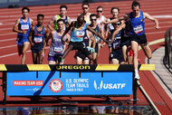 Hillary Bor and Matthew Wilkinson compete in the first round of the men's 3000 meter steeplechase
