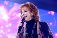 Reba McEntire performs on stage during Inaugural Gateway Celebrity Fight Night