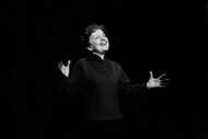 Edith Piaf performing on stage.
