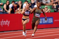 Kennedy Blackmon and Sha'Carri Richardson run on an Olympic track.