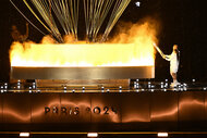 Olympic Flame being lit at the 2024 Olympics Opening Ceremony