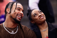 Simone Biles and Jonathan Owens attend a game between the Houston Rockets and the Los Angeles Lakers